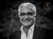 Porträt von Dr. Said Mansouri in Schwarz-Weiß mit Brille und Anzug, im Bildeck das Logo „Ballades – Dr. Said Mansouri" mit Mikrofon-Icon